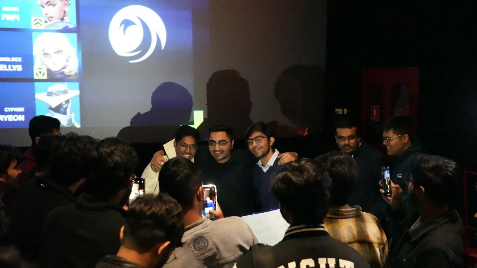 Fans gather in front of the cinema screen after the match