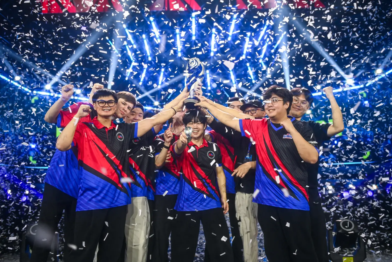 The Global Esports team lifts the VCT Pacific Stage 2 trophy under falling confetti in Busan